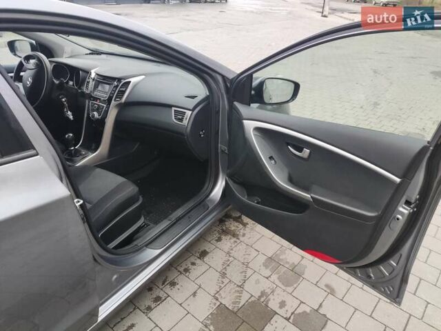 Серый Хендай i30, объемом двигателя 1.4 л и пробегом 77 тыс. км за 9100 $, фото 5 на Automoto.ua