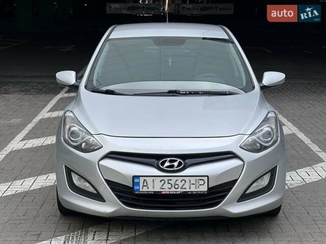 Серый Хендай i30, объемом двигателя 1.4 л и пробегом 203 тыс. км за 8500 $, фото 2 на Automoto.ua