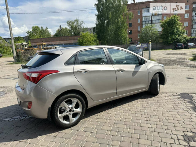 Сірий Хендай i30, об'ємом двигуна 1.4 л та пробігом 207 тис. км за 8999 $, фото 6 на Automoto.ua