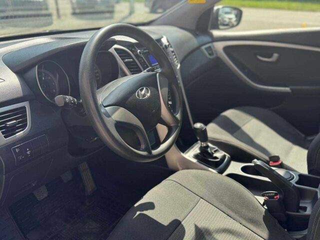 Сірий Хендай i30, об'ємом двигуна 1.4 л та пробігом 124 тис. км за 9700 $, фото 7 на Automoto.ua