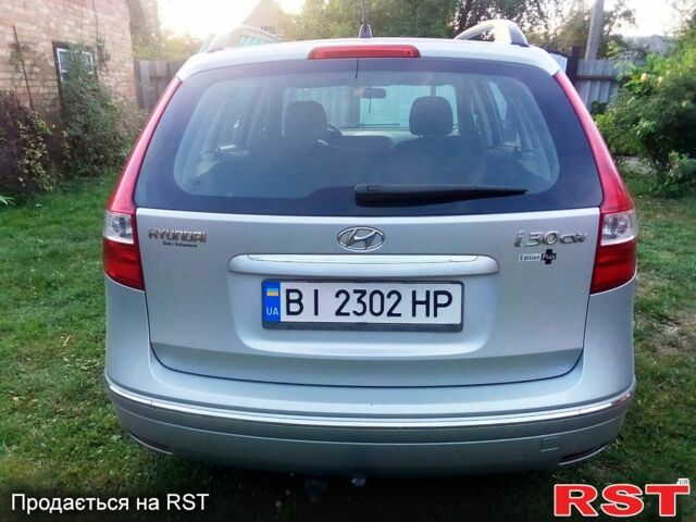 Серый Хендай i30, объемом двигателя 1.4 л и пробегом 155 тыс. км за 6100 $, фото 3 на Automoto.ua