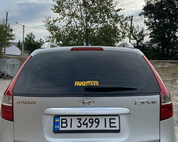 Серый Хендай i30, объемом двигателя 1.58 л и пробегом 270 тыс. км за 6499 $, фото 4 на Automoto.ua