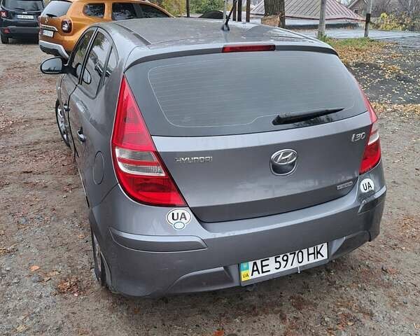 Серый Хендай i30, объемом двигателя 1.58 л и пробегом 152 тыс. км за 5400 $, фото 1 на Automoto.ua
