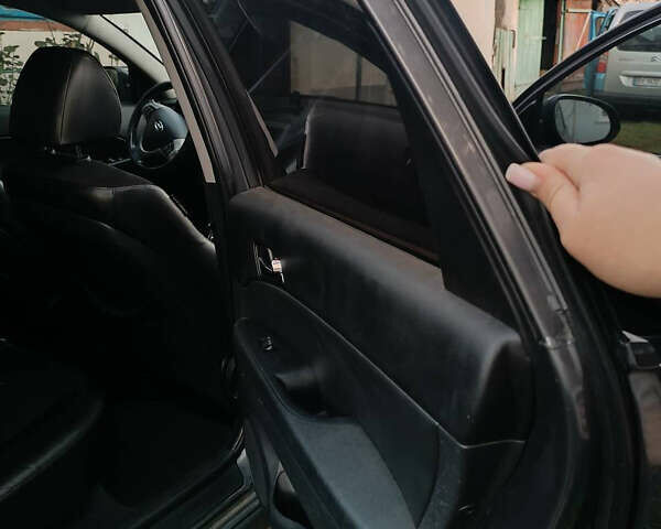 Серый Хендай i30, объемом двигателя 1.58 л и пробегом 348 тыс. км за 6000 $, фото 7 на Automoto.ua