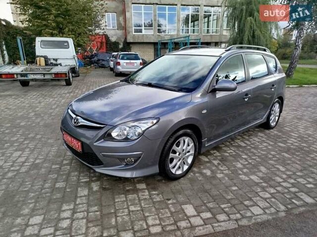Сірий Хендай i30, об'ємом двигуна 1.4 л та пробігом 166 тис. км за 6350 $, фото 11 на Automoto.ua