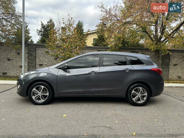 Сірий Хендай i30, об'ємом двигуна 1.58 л та пробігом 150 тис. км за 9800 $, фото 3 на Automoto.ua