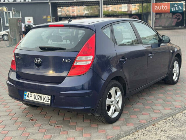 Синий Хендай i30, объемом двигателя 1.4 л и пробегом 260 тыс. км за 4450 $, фото 1 на Automoto.ua