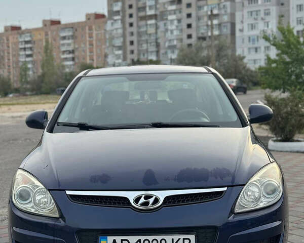 Синий Хендай i30, объемом двигателя 1.4 л и пробегом 260 тыс. км за 4450 $, фото 5 на Automoto.ua
