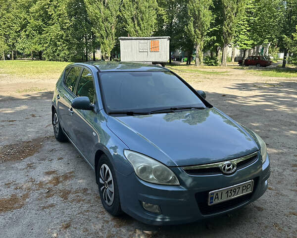 Синий Хендай i30, объемом двигателя 1.58 л и пробегом 279 тыс. км за 5500 $, фото 2 на Automoto.ua