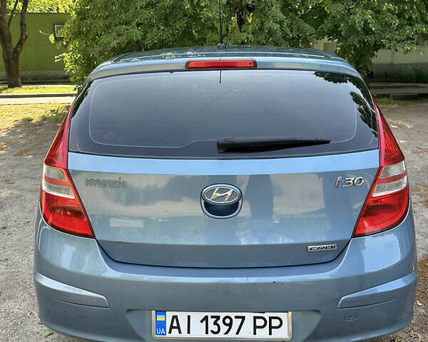 Синий Хендай i30, объемом двигателя 1.58 л и пробегом 279 тыс. км за 5500 $, фото 7 на Automoto.ua