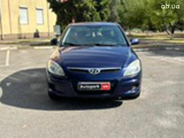 Синий Хендай i30, объемом двигателя 1.4 л и пробегом 265 тыс. км за 5350 $, фото 6 на Automoto.ua