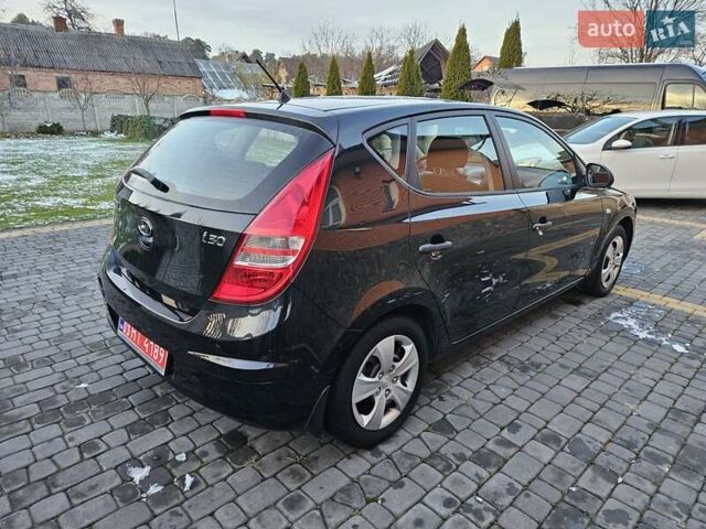 Синий Хендай i30, объемом двигателя 1.4 л и пробегом 184 тыс. км за 5500 $, фото 5 на Automoto.ua