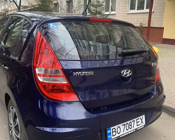Синий Хендай i30, объемом двигателя 1.4 л и пробегом 212 тыс. км за 5800 $, фото 3 на Automoto.ua