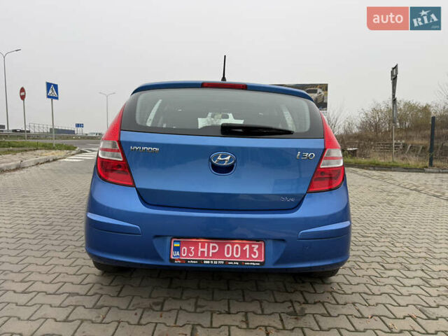 Синий Хендай i30, объемом двигателя 1.4 л и пробегом 235 тыс. км за 6350 $, фото 4 на Automoto.ua