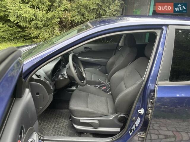 Синий Хендай i30, объемом двигателя 1.4 л и пробегом 155 тыс. км за 6700 $, фото 13 на Automoto.ua