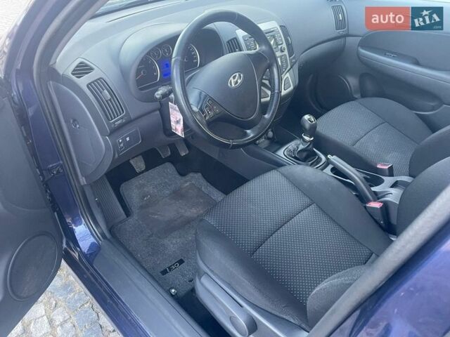 Синий Хендай i30, объемом двигателя 1.4 л и пробегом 225 тыс. км за 7000 $, фото 10 на Automoto.ua