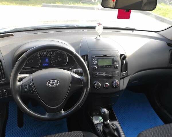 Синий Хендай i30, объемом двигателя 1.58 л и пробегом 257 тыс. км за 7200 $, фото 13 на Automoto.ua