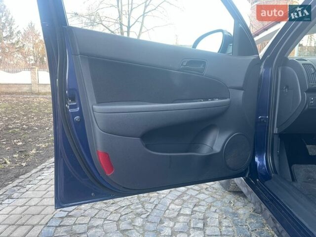 Синий Хендай i30, объемом двигателя 1.4 л и пробегом 225 тыс. км за 7490 $, фото 12 на Automoto.ua