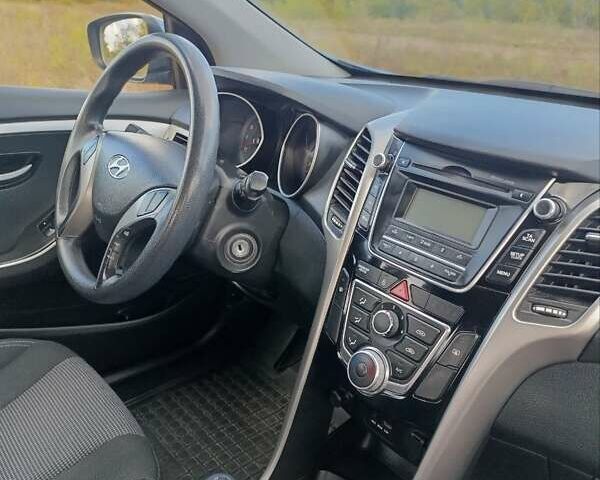 Синий Хендай i30, объемом двигателя 1.4 л и пробегом 158 тыс. км за 8500 $, фото 9 на Automoto.ua