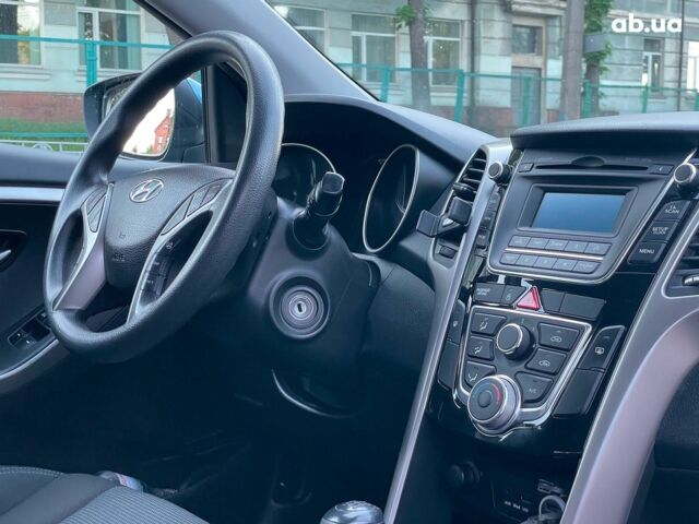 Синий Хендай i30, объемом двигателя 1.4 л и пробегом 178 тыс. км за 7690 $, фото 23 на Automoto.ua