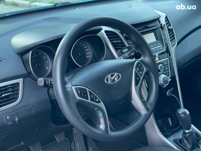 Синий Хендай i30, объемом двигателя 1.4 л и пробегом 178 тыс. км за 7690 $, фото 14 на Automoto.ua