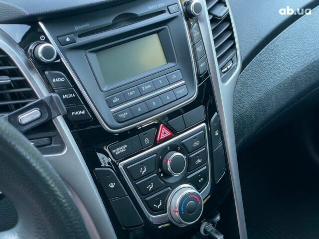Синий Хендай i30, объемом двигателя 1.4 л и пробегом 178 тыс. км за 7690 $, фото 15 на Automoto.ua