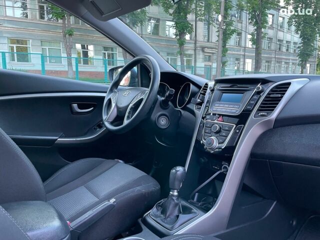 Синий Хендай i30, объемом двигателя 1.4 л и пробегом 178 тыс. км за 7690 $, фото 22 на Automoto.ua