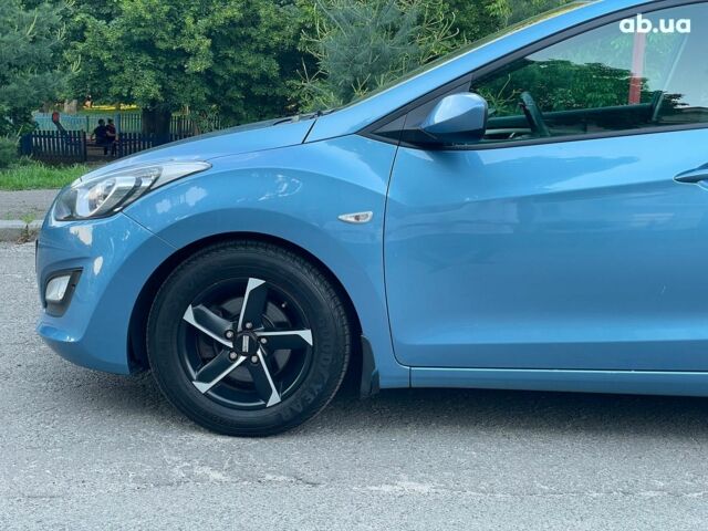 Синий Хендай i30, объемом двигателя 1.4 л и пробегом 178 тыс. км за 7690 $, фото 10 на Automoto.ua