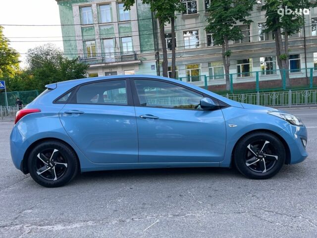 Синий Хендай i30, объемом двигателя 1.4 л и пробегом 178 тыс. км за 7690 $, фото 5 на Automoto.ua