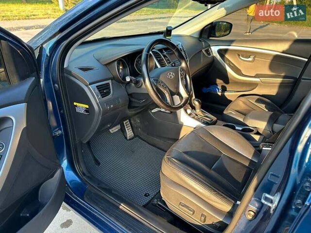 Синий Хендай i30, объемом двигателя 2 л и пробегом 64 тыс. км за 12800 $, фото 5 на Automoto.ua