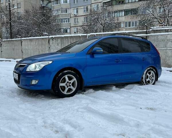 Синій Хендай i30, об'ємом двигуна 2 л та пробігом 235 тис. км за 9300 $, фото 6 на Automoto.ua