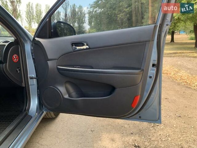Синий Хендай i30, объемом двигателя 1.59 л и пробегом 230 тыс. км за 5800 $, фото 28 на Automoto.ua