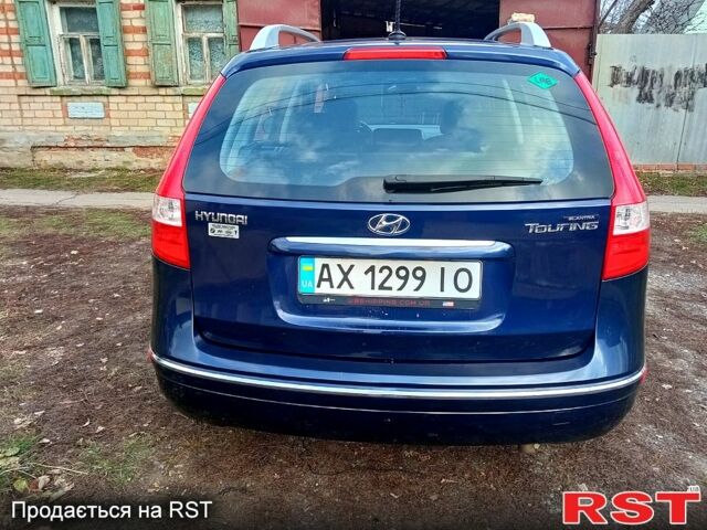 Синій Хендай i30, об'ємом двигуна 2 л та пробігом 157 тис. км за 6600 $, фото 3 на Automoto.ua