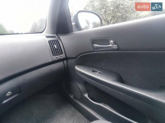 Синій Хендай i30, об'ємом двигуна 1.58 л та пробігом 218 тис. км за 6500 $, фото 2 на Automoto.ua