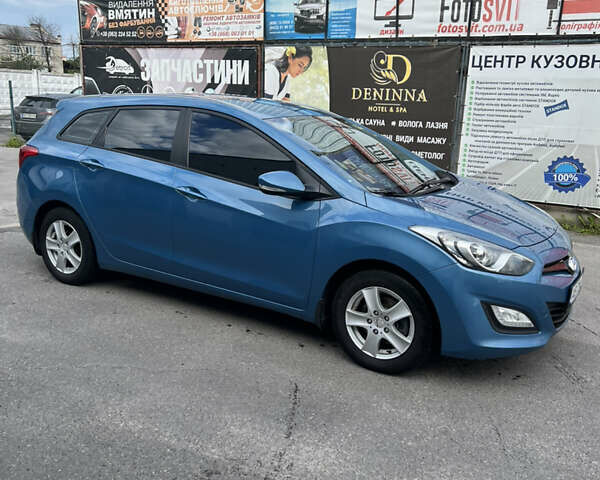 Синий Хендай i30, объемом двигателя 1.6 л и пробегом 228 тыс. км за 8300 $, фото 3 на Automoto.ua