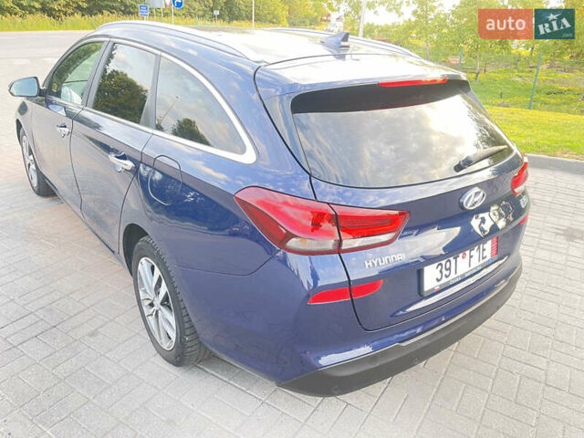 Синій Хендай i30, об'ємом двигуна 1.4 л та пробігом 201 тис. км за 11800 $, фото 8 на Automoto.ua