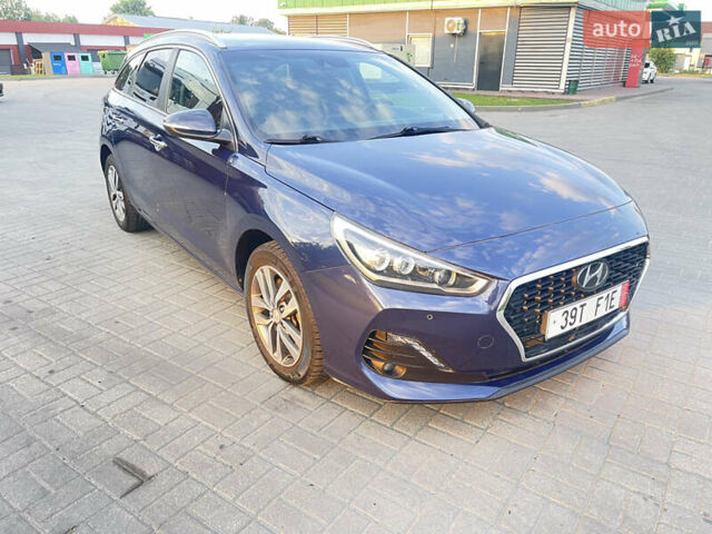 Синій Хендай i30, об'ємом двигуна 1.4 л та пробігом 201 тис. км за 11800 $, фото 1 на Automoto.ua