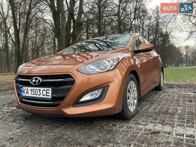 Оранжевый Хендай i30, объемом двигателя 1.4 л и пробегом 86 тыс. км за 10000 $, фото 7 на Automoto.ua