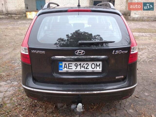 Чорний Хендай i30 Wagon, об'ємом двигуна 2 л та пробігом 176 тис. км за 7800 $, фото 3 на Automoto.ua