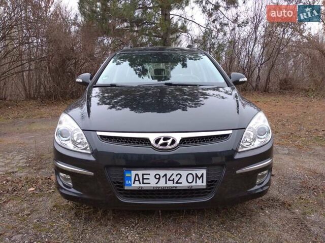 Чорний Хендай i30 Wagon, об'ємом двигуна 2 л та пробігом 176 тис. км за 7800 $, фото 1 на Automoto.ua