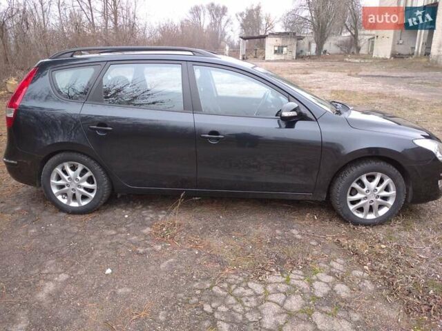 Чорний Хендай i30 Wagon, об'ємом двигуна 2 л та пробігом 176 тис. км за 7800 $, фото 2 на Automoto.ua