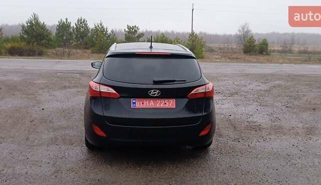 Черный Хендай i30 Wagon, объемом двигателя 1.6 л и пробегом 236 тыс. км за 8999 $, фото 7 на Automoto.ua