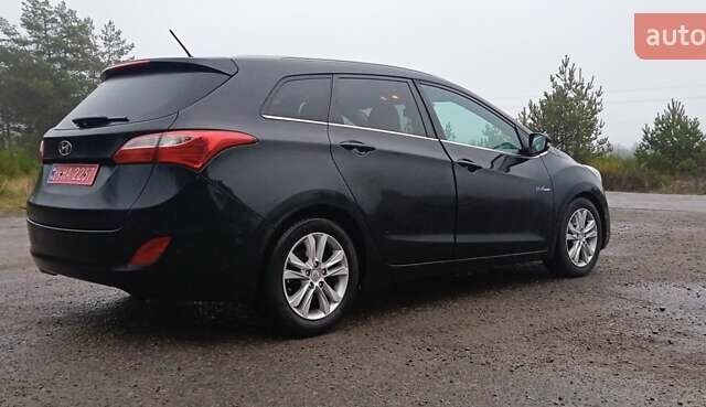 Черный Хендай i30 Wagon, объемом двигателя 1.6 л и пробегом 236 тыс. км за 8999 $, фото 5 на Automoto.ua