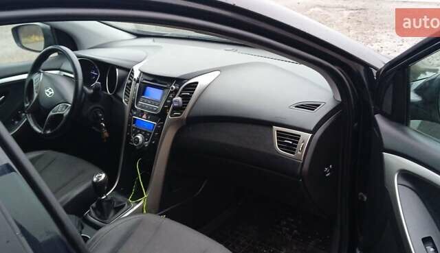 Черный Хендай i30 Wagon, объемом двигателя 1.6 л и пробегом 236 тыс. км за 8999 $, фото 11 на Automoto.ua
