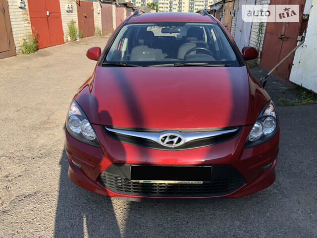 Красный Хендай i30 Wagon, объемом двигателя 1.6 л и пробегом 64 тыс. км за 8600 $, фото 3 на Automoto.ua