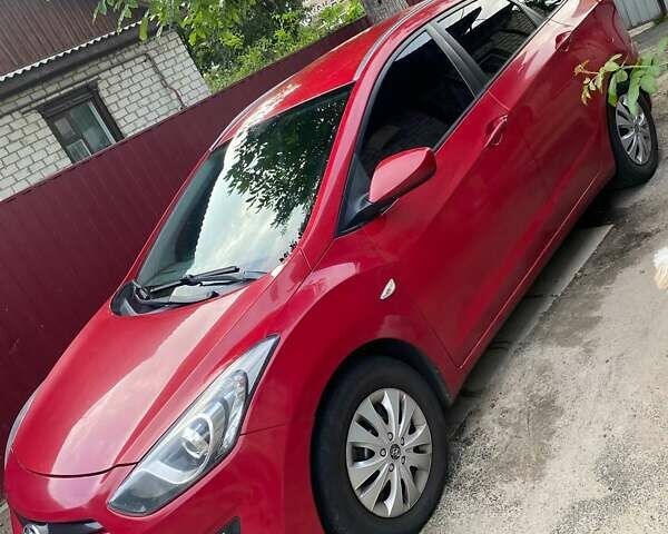 Красный Хендай i30 Wagon, объемом двигателя 1.4 л и пробегом 254 тыс. км за 8000 $, фото 7 на Automoto.ua