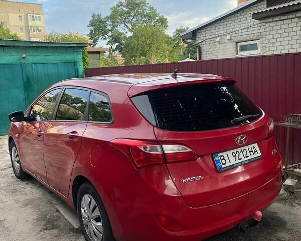 Красный Хендай i30 Wagon, объемом двигателя 1.4 л и пробегом 254 тыс. км за 8000 $, фото 2 на Automoto.ua