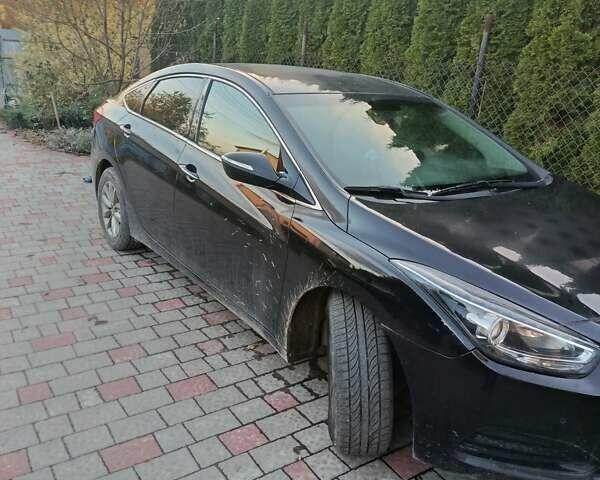 Черный Хендай и40, объемом двигателя 1.7 л и пробегом 154 тыс. км за 10900 $, фото 4 на Automoto.ua