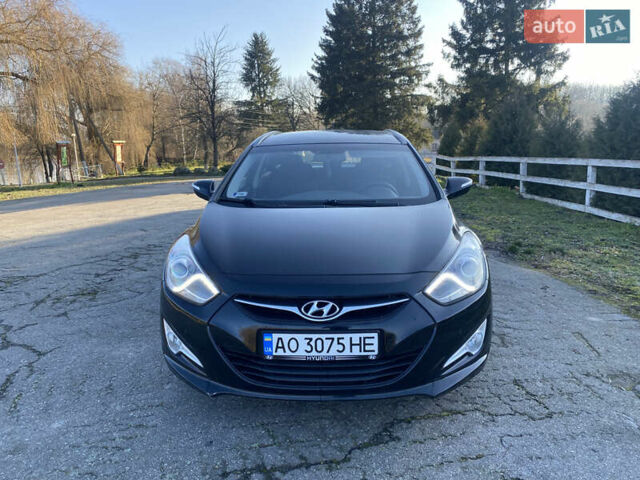 Черный Хендай и40, объемом двигателя 1.59 л и пробегом 237 тыс. км за 6950 $, фото 1 на Automoto.ua