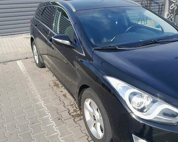 Чорний Хендай і40, об'ємом двигуна 1.69 л та пробігом 255 тис. км за 9000 $, фото 2 на Automoto.ua